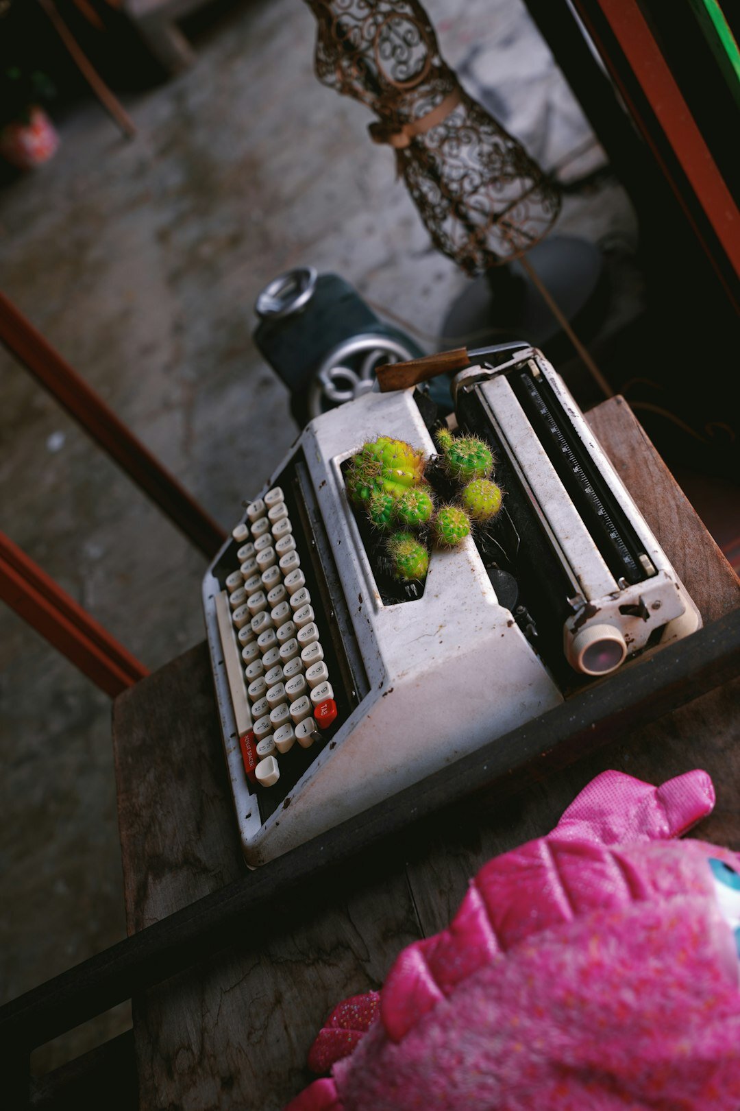 Still life of an antique typewriter and vintage accessories