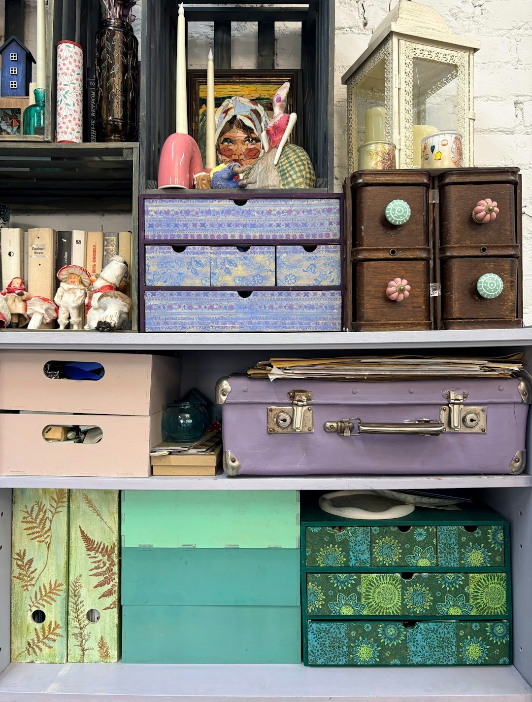 Bookshelf filled with vintage magazines and archival boxes